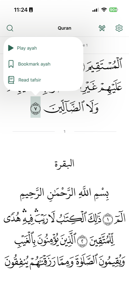 Pocket Quran reader showing Arabic Quran text and the ayah action menu